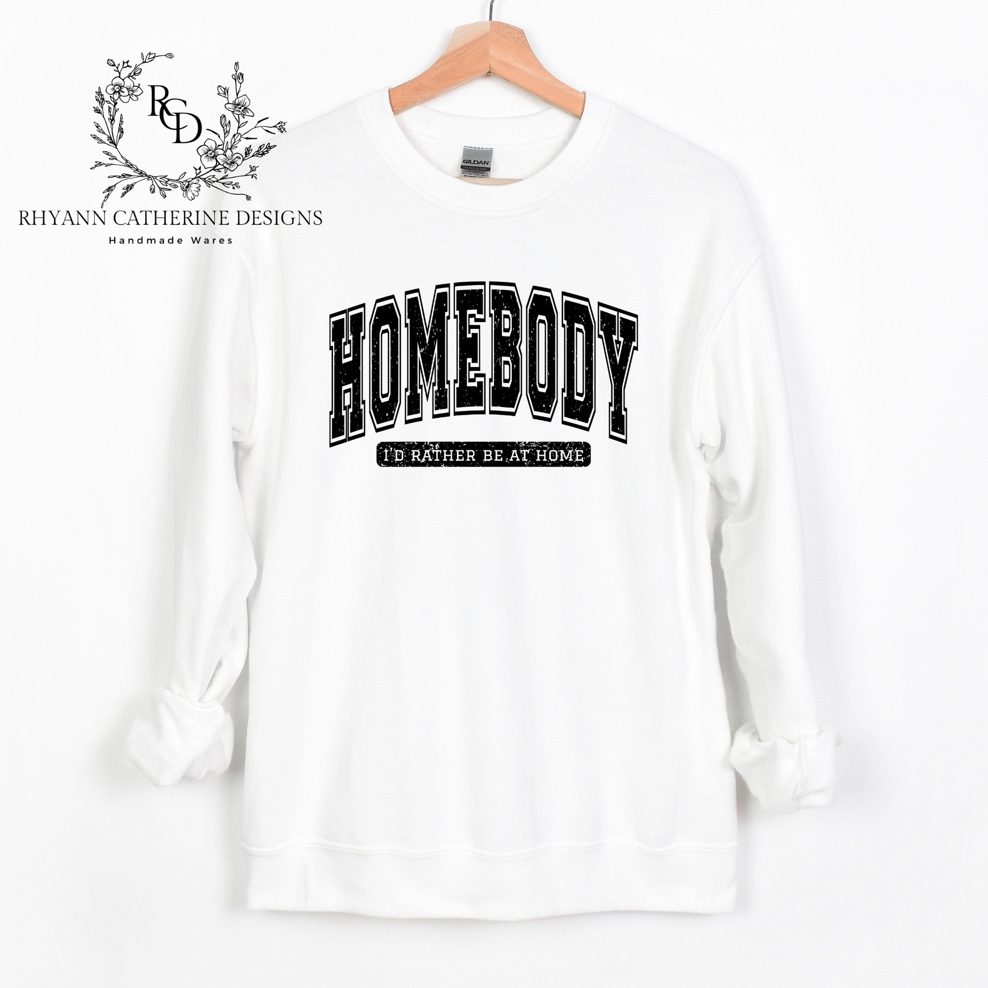 white crewneck, white sweatshirt, distressed homebody, hanging up